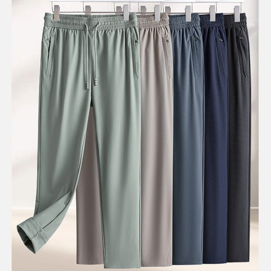 Spodnie sportowe materiał szybkoschnący– materiał chłodzący, luźny krój 👖