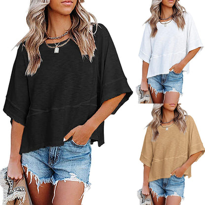 💃 Damski luźny T-shirt z rękawami dzwonami – jednolity kolor, łączony fason, który nadaje lekkości i stylu każdej stylizacji! ✨👕